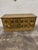 Eclectic gold leaf chest with antique mirrored panels. Great size and storage.