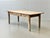 A rustic country-style table made of solid softwood with an authentic look and a beautiful patina that has developed over...
