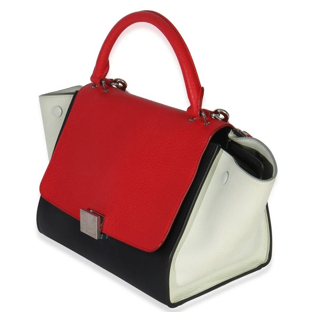 Item #: 152899 Interior Material: Leather Size: Small Features Interior: Two slip pockets Dimensions: 10.5 x 8 x 6 in...