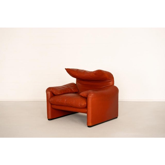 The Maralunga lounge chair by Vico Magistretti for Cassina, designed in 1973, is a defining icon of Italian modernism,...