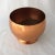 A beautiful copper pedestal bowl that would be perfect for displaying your favorite flowers in a unique way. It's in...