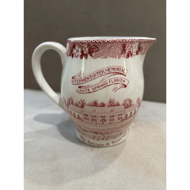 Celebrate a piece of American history with this charming vintage Old English Staffordshire Ware pitcher featuring the...