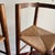 Unique pair of Mid-Century bar stools. Features paperboard seats, bentwood back and solid wood frame structure. Seat...