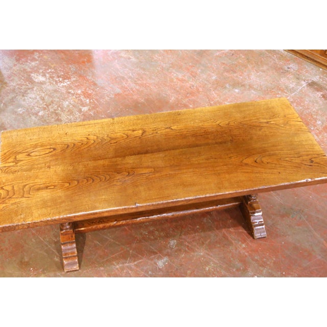 This elegant French Louis XIII style monastery dining table was crafted in the Pyrenees region of France circa 1970 using...