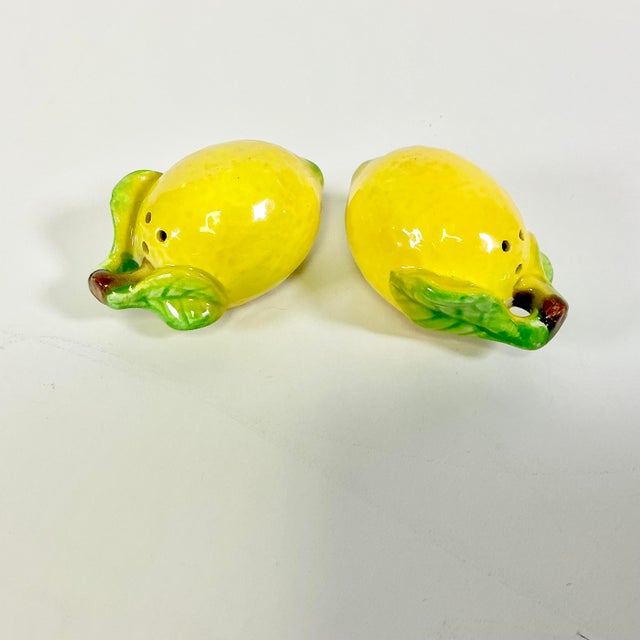 Vintage Home is pleased to offer an iconic set of Trompe L’Oeil style Lemon Salt & Pepper Shakers. These have a high gloss...