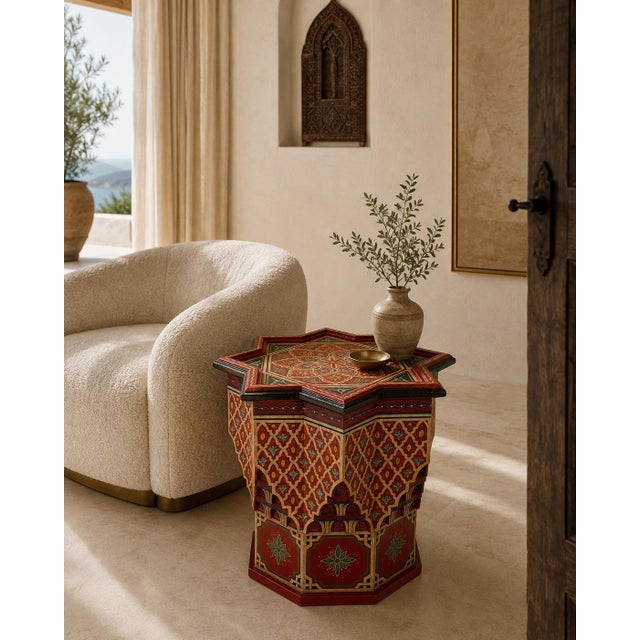 A highly decorative mid-20th-century Moroccan Moorish hand-painted wood side table, distinguished by its sculptural eight-...