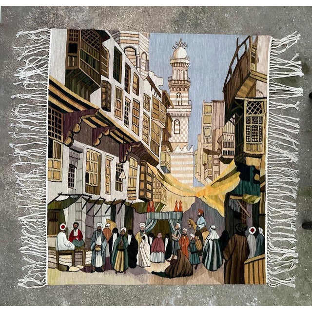 Very pretty vintage Tunisian tapestry with beautiful design of the bazaar in the town, with beautiful colors, entirely...