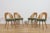 This set of four dining chairs was designed by Antonín Šuman for the Czechoslovak furniture maker MIER Topoľčany during...