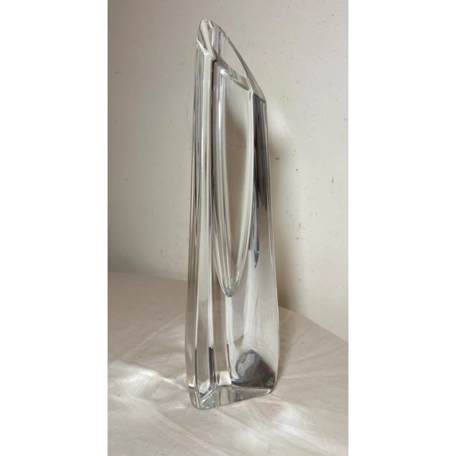 Crafted with precision, this exquisite Baccarat crystal vase showcases the artistry of master glass smiths. Its triangular...