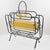 This stunning Mid-Century modernist magazine holder or rack is commonly attributed to Mathieu Matégot (1910-2001). This...