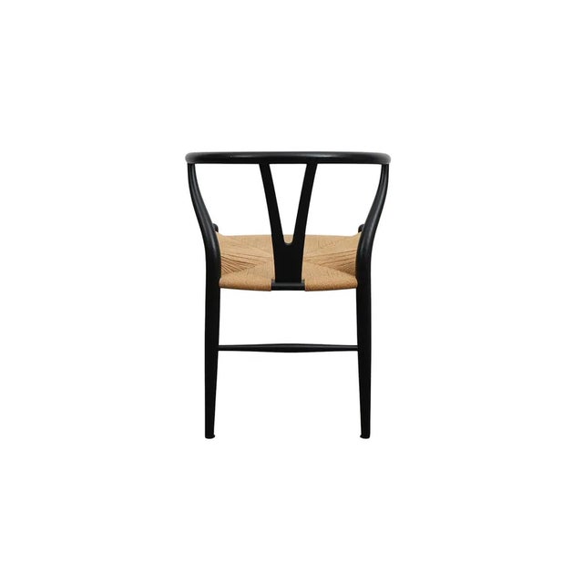 The product is a set of 6 fully assembled Carl Hansen Black "Wishbone" chairs with rush seats, designed by Hans Wegner....