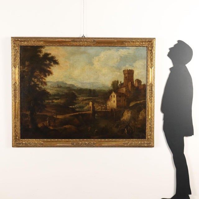 Oil on canvas. Venetian school of the 18th century. Large landscape of pre-Alpine hills, crossed by a stream that reaches...