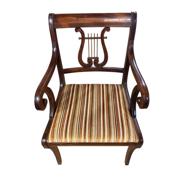 Elegant Empire Revival armchair featuring a carved lyre splat accented with brass-tone strings, graceful scrolled arms,...