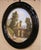 This charming antique landscape painting captures a peaceful rural scene with a stone bridge, architectural ruins,...