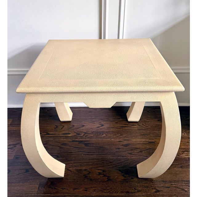 A square end table completely clad in embossed leather that mimics Shagreen skin circa 1970-80s. The versatile table...