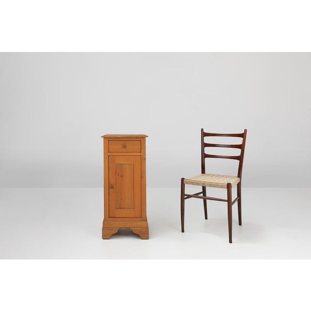 A charming French nightstand from the 1930s, crafted in pine and blending early Art Deco geometry with the warmth and...