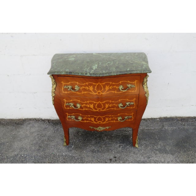 This classic Dresser is made out of wood, solid wood, veneer, metal, and marble. This Commode was made in the lovely...