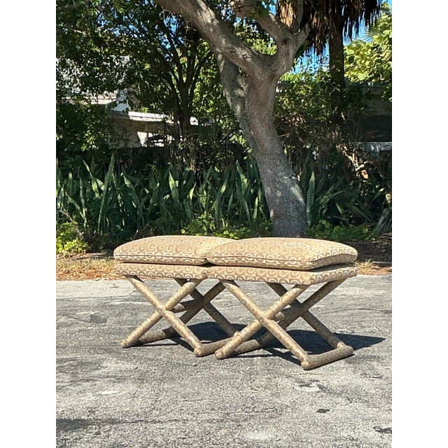 Add a touch of retro glamour to your space with this stunning pair of vintage boho mod X-benches. Featuring a bold...