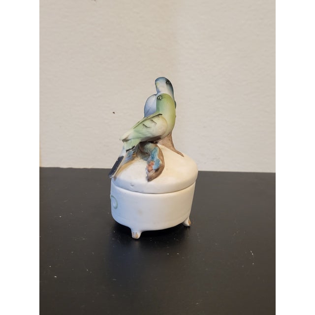 This adorable little Lefton hand painted trinket box is perfect for storage or display. These adorable parakeets seem to...
