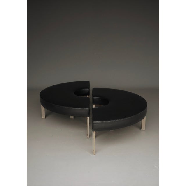 Two semi-circular benches that can be arranged in various fashions to suit interior spaces and functions. These versatile...