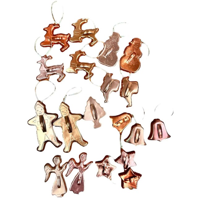 Large set of nineteen (19) holiday cookie cutters, copper over aluminum. These vintage cookie cutters are already for your...