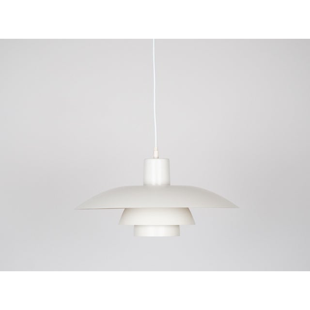 The ph 4/3 lamp is an absolute classic, designed by the renowned danish designer and architect poul henningsen. It has...