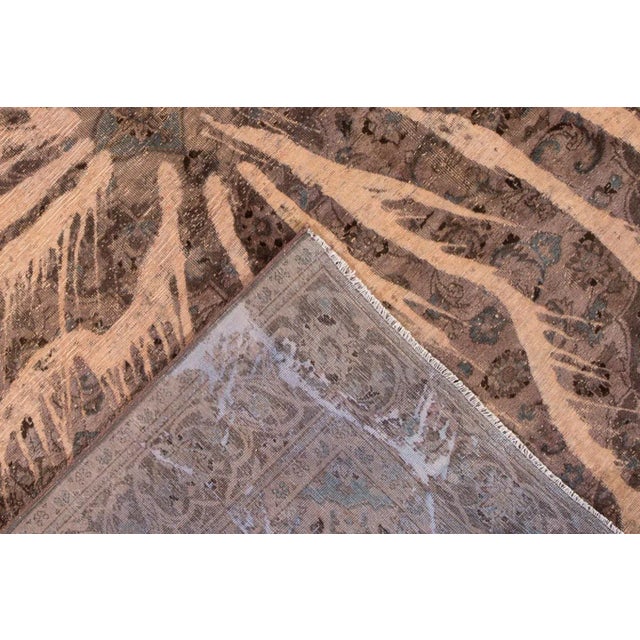 Beautiful vintage Persian Overdyed hand-knotted wool rug with a beige field. This piece has beige and gray accents in an...