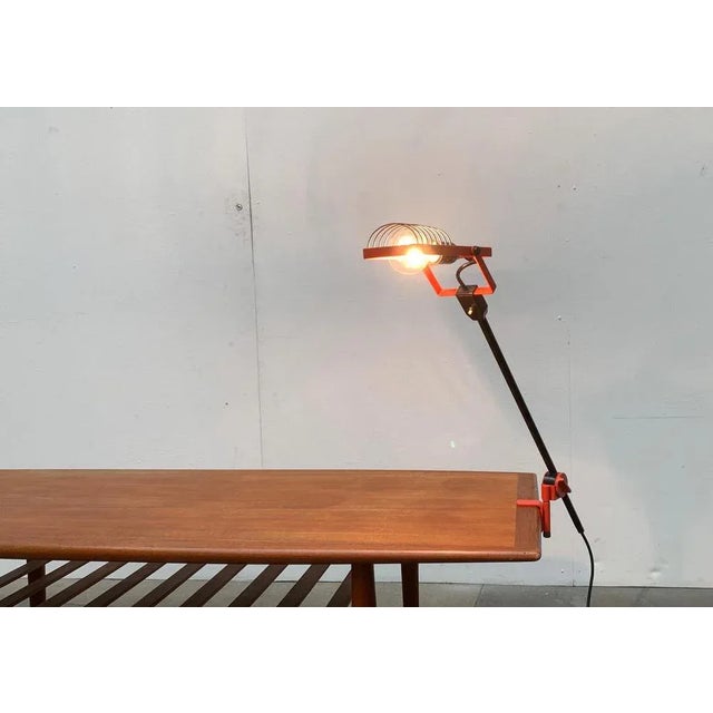 Rare table lamp from the Sintesi series of the Italian manufacturer Artemide designed by Ernesto Gismondi in the 70s. The...