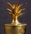 Solid brass pineapple covered urn. Warm gold color.