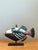 This vibrant vintage hand-painted ceramic fish sculpture is a captivating example of mid-century decorative artistry,...