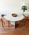 One of a kind postmodern italian designer 1970s off white round solid travertine dining table with sculptural pedestal...