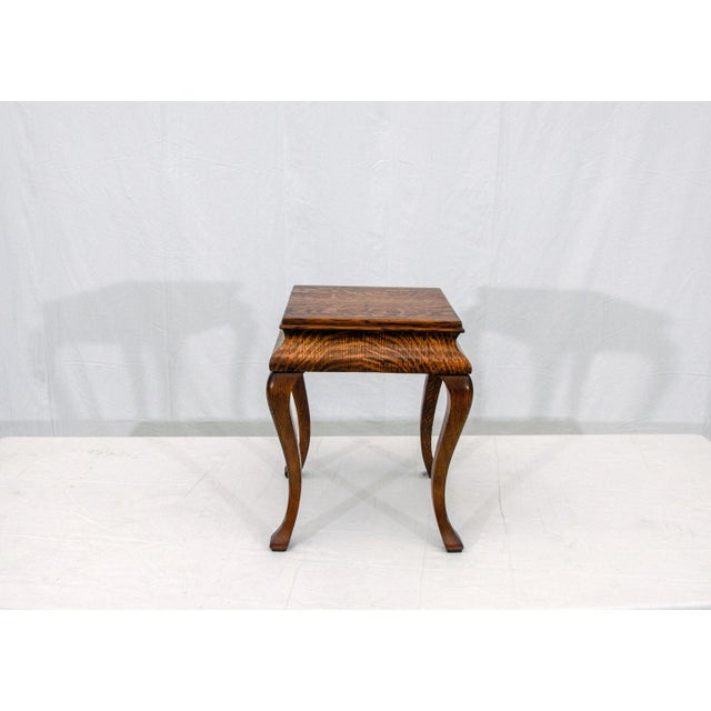 This small American antique quarter-sawn oak table can be used for a plant display as well as an individual drink table...