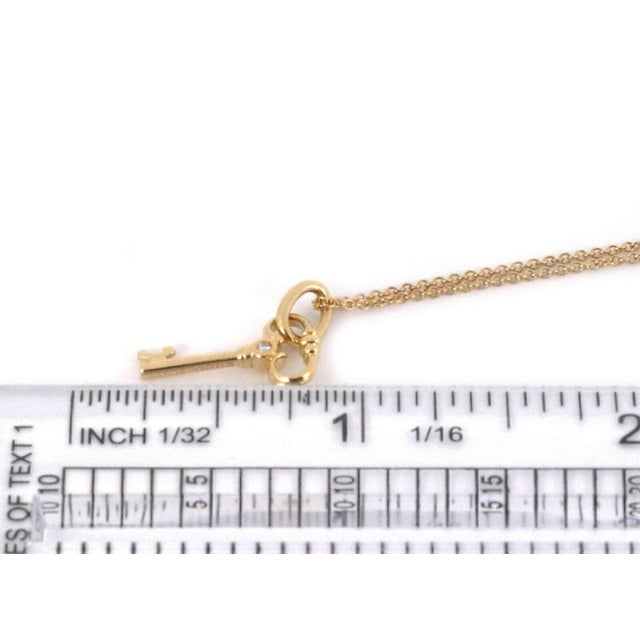 Mid 20th Century Mid 20th Century Tiffany & Co 18K Yellow Gold Diamond Key Pendant Necklace For Sale - Image 5 of 7