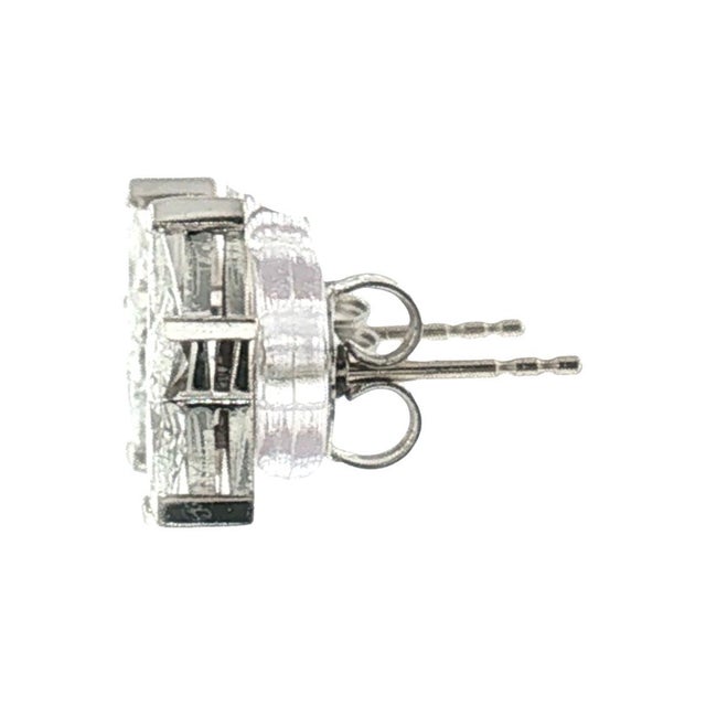A striking pair of 18k white gold star-shaped stud earrings. Crafted with kite-cut diamonds with a total weight of 0.5...