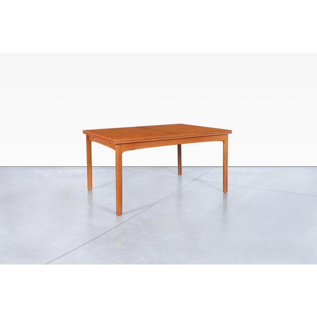 Designed by celebrated Swedish designer Folke Ohlsson for DUX during the 1960s, this mid-century modern expanding dining...