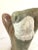 1960s Marble Sculpture Of A Woman With Oversized Hands and textured hair Polished and Raw Stone Surfaces Colors: Red, Green.