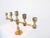 This candleholder in brass was manufactured by Gusum Metall Slöjd. Imprinted by Maker