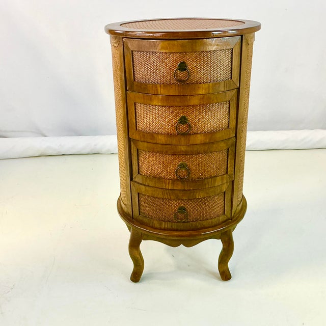 Vintage Home is pleased to offer this lovely wood and Herringbone woven Cane Round Storage Cabinet. It’s in the style of...