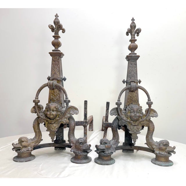 Add a touch of antique elegance to your fireplace with this stunning pair of solid bronze and cast iron figural fireplace...