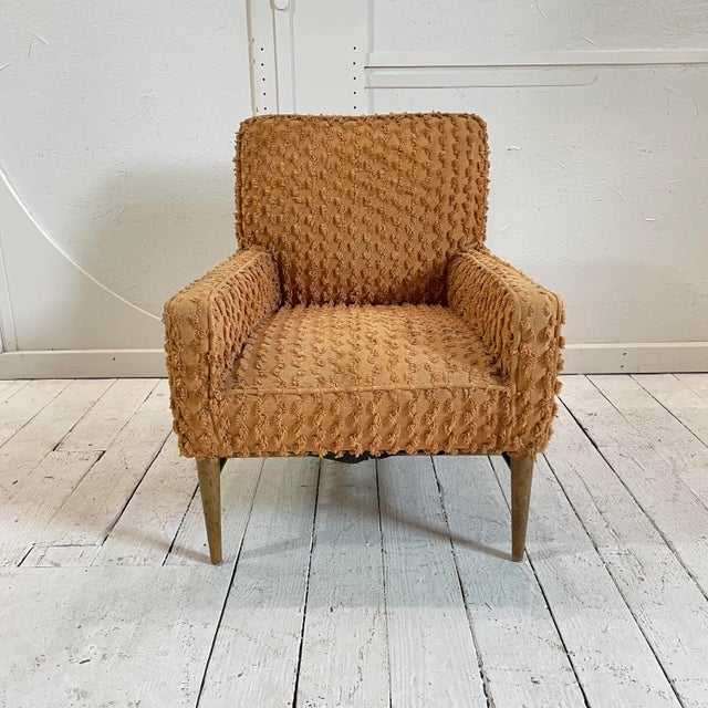 Uncommon Paul Mccobb club chair that was recovered in the late 70's with the amazing orange fabric. The chair no longer...