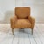 Uncommon Paul Mccobb club chair that was recovered in the late 70's with the amazing orange fabric. The chair no longer...