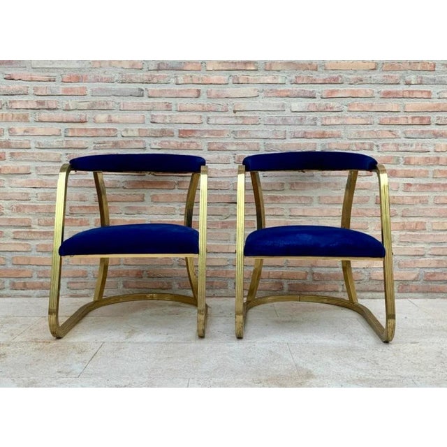 Pair of Midcentury Brass Chairs with Blue Velvet Upholstery Very comfortable chairs with seat and back in original blue...