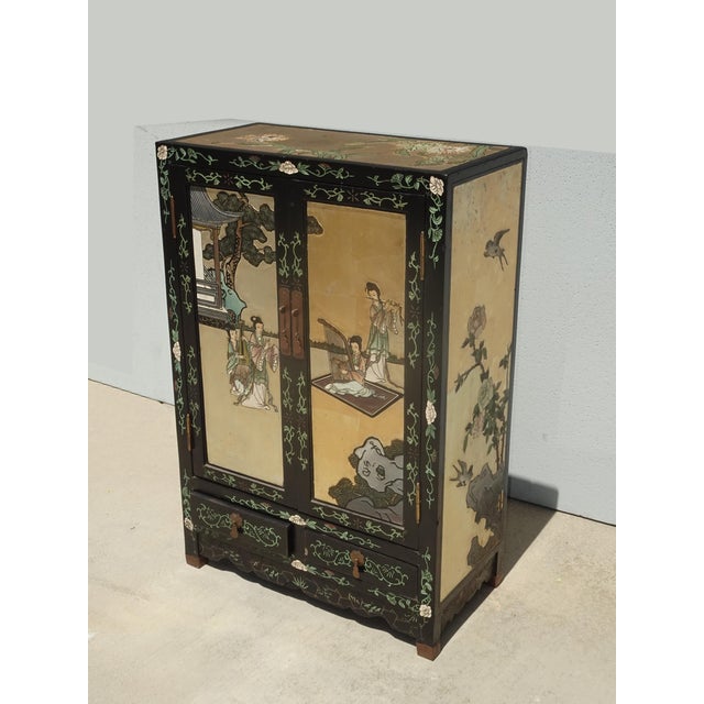 Gorgeous Cabinet in Good Vintage Condition. Solid and Firm. There is wear to the finish along the edges that is usual for...