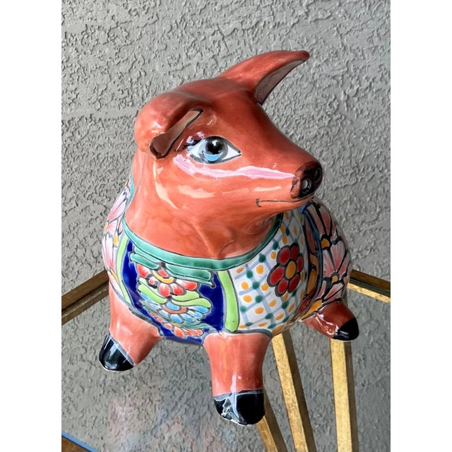 Excellent Pre-Owned Condition. With its impish face and all together splendid color palette, this little piglet is...