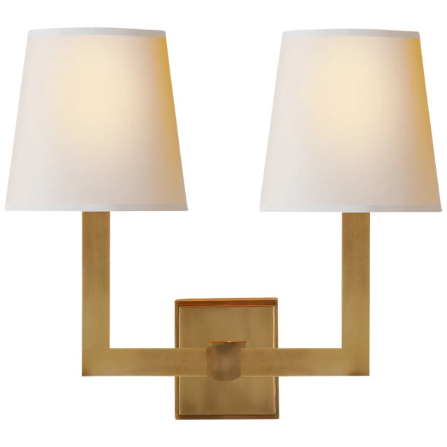 Square Tube Double Sconce in Hand-Rubbed Antique Brass with Natural Paper Shades Designer: Chapman & Myers Height: 14"...