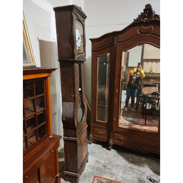 Handsome 19th-century French provincial tall case clock in the classic Comtoise (Morbier) tradition. The clock features an...