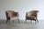 Set of vintage lounge chairs, original from the 1960s, fully restored by Stamford Modern. These striking chairs feature...
