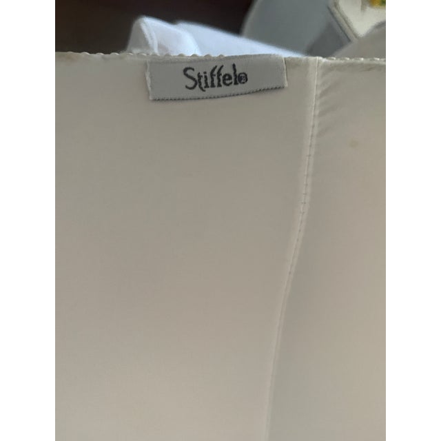 Lovely Stiffel lamp with original shade. It's 30 3/4" tall from top of finial to base. It's from the 70's. No noticeable...