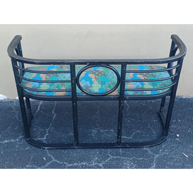Vintage Josef Hoffmann style bench with a blue patterned colorful cushion. Appears to be constructed out of bentwood.