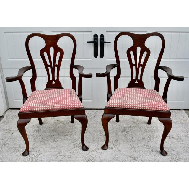 Antique (1920's) Set of Two Arm Chairs have a Queen Anne Style. Made of Wood. Mahogany Carved Wood. The Seats have a...